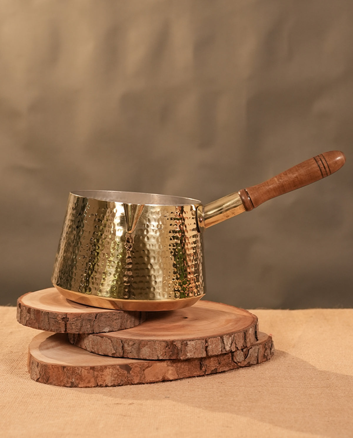 Brass saucepan tincoated with wood handle