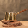 Brass saucepan tincoated with wood handle