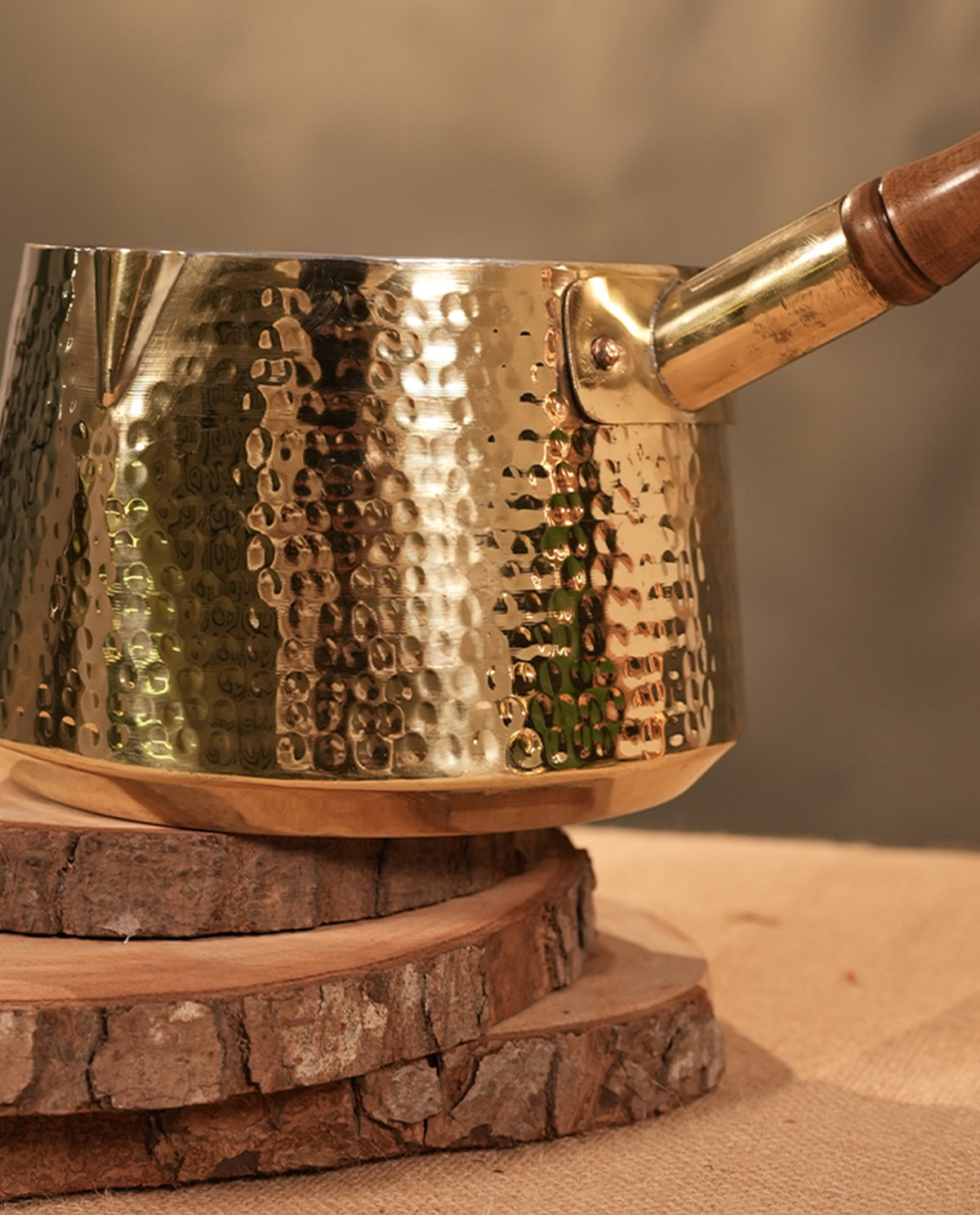Brass saucepan tincoated with wood handle